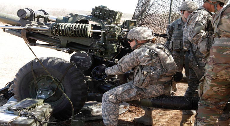 Pfc. Katherine Beatty takes her turn at the M119A3 howitzer during final advanced individual training, Fort Sill, Okla.