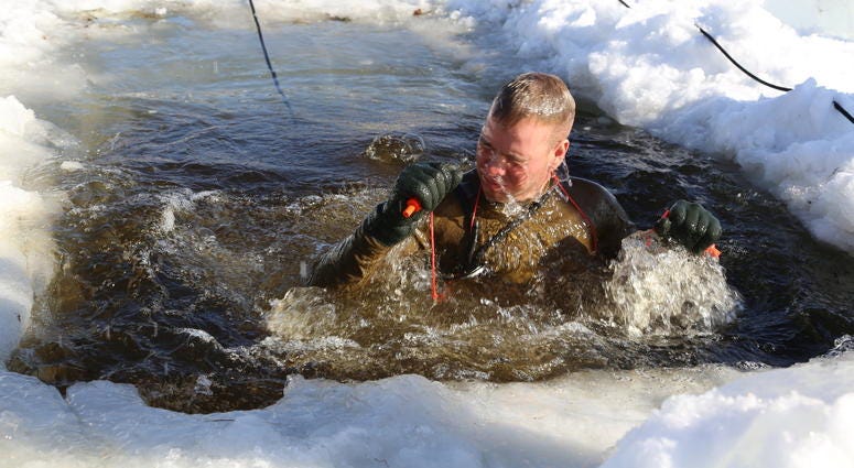A student in the Cold-Weather Operations Course (CWOC) Class 18-04 participates in cold-water immersion training as part of the course training Feb. 14, 2018, at Fort McCoy, Wis. A student in the Cold-Weather Operations Course (CWOC) Class 18-04 participates in cold-water immersion training as part of the course training Feb. 14, 2018, at Fort McCoy, Wis.
