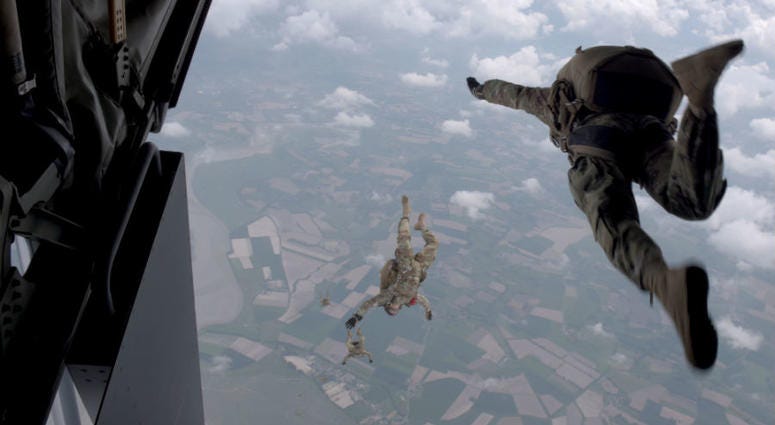 U.S Army Special Forces commemorate WWII with jump into Mont Saint-Michel, Normandy, France. U.S Army Special Forces commemorate WWII with jump into Mont Saint-Michel, Normandy, France.