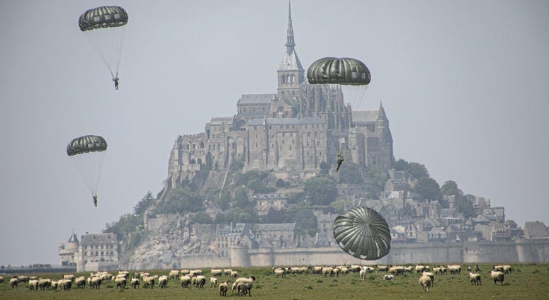 U.S Army Special Forces commemorate WWII with jump into Mont Saint-Michel, Normandy, France. U.S Army Special Forces commemorate WWII with jump into Mont Saint-Michel, Normandy, France.