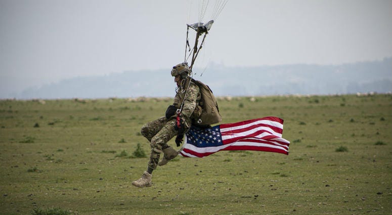 U.S Army Special Forces commemorate WWII with jump into Mont Saint-Michel, Normandy, France. U.S Army Special Forces commemorate WWII with jump into Mont Saint-Michel, Normandy, France.