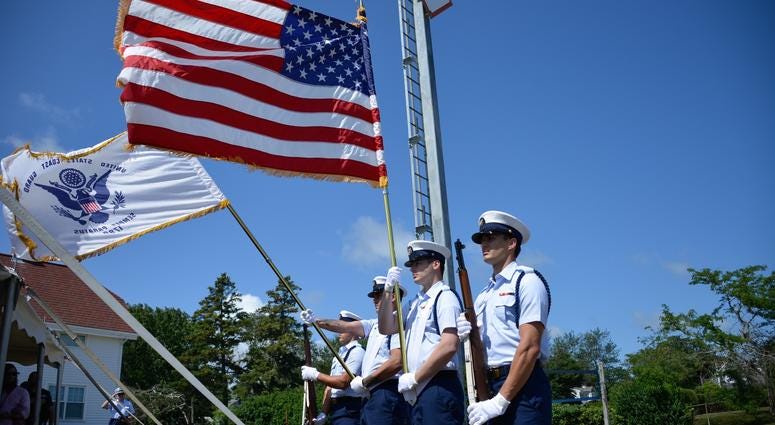 Coast Guard Base Cape Cod Honor Guard presents the colors