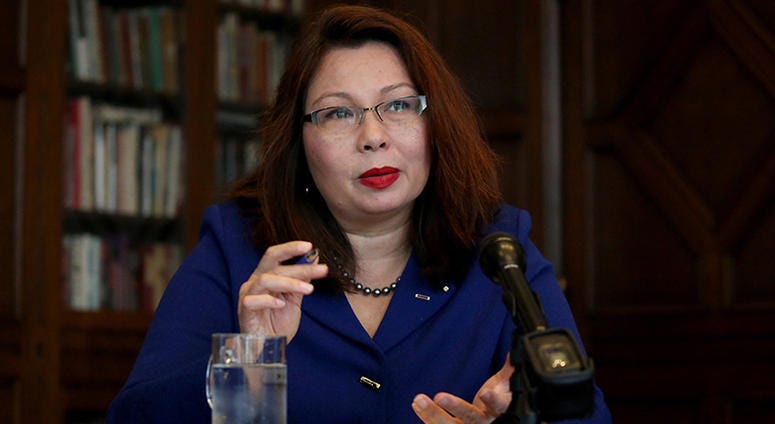 Tammy Duckworth answers a question from the Chicago Tribune editorial board during a joint appearance with Mark Kirk on Oct. 3, 2016 at Tribune Tower in Chicago.