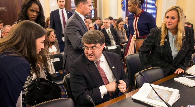 U.S. Secretary of Veterans' Affairs Robert Wilkie prepares to depart after testifying during a Senate Veterans' Affairs Committee hearing on suicide among veterans on June 19, 2019 in Washington, DC. Wilkie