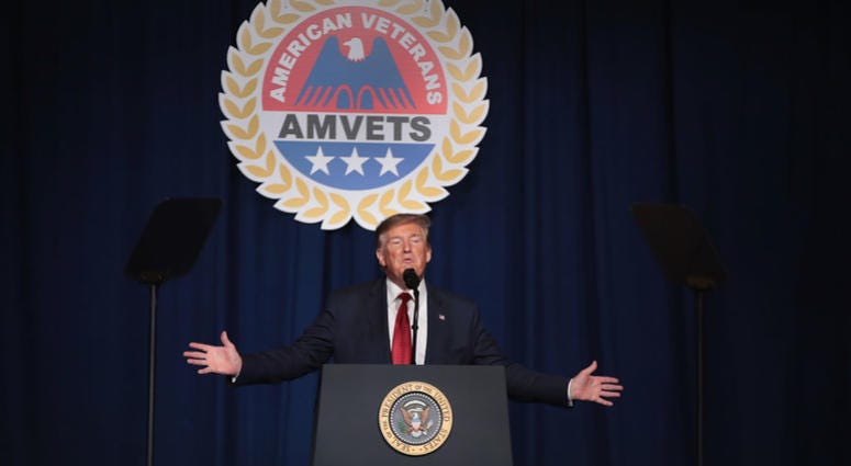 President Donald Trump speaks to guests during the Joint Opening Ceremony at the American Veterans (AMVETS) 75th National Convention at the Galt House on August 21, 2019 in Louisville, Kentucky. Trump