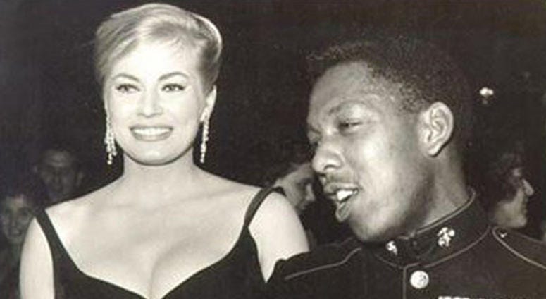 Retired Sgt. Maj. Louis Roundtree escorted Swedish movie star Anita Ekberg to a Marine Corps Ball.