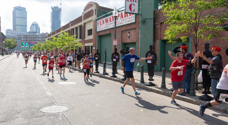 Runners take part in the Run To Home Base fundraiser at Fenway Park Runners take part in the Run To Home Base fundraiser at Fenway Park