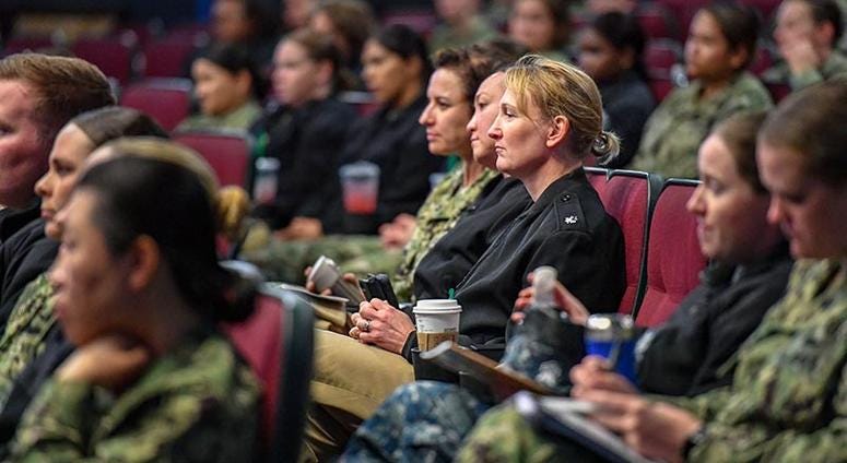 SAN DIEGO (March 26, 2019) -- Sailors listen to a guest speaker at the annual Women's Waterfront Symposium on board Naval Base San Diego. The symposium featured Capt. Jen Ellinger, commanding officer of USS Lake Champlain (CG 57), as the keynote speaker a Commander, Naval Surface Force, U.S. Pacific Fleet