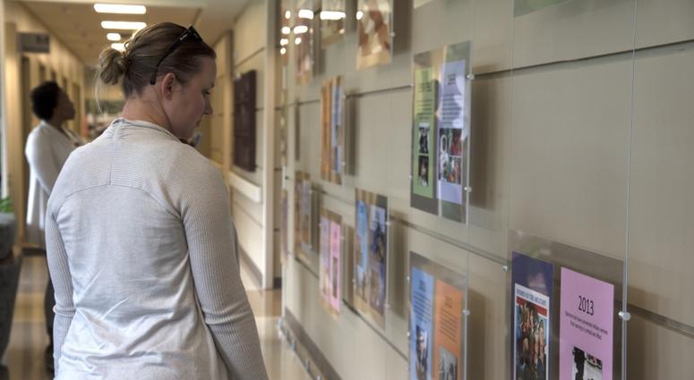 A Women’s Health Transition Assistance Program participant reads excerpts about female veterans while on a tour of the Women’s Center at the James A. Haley Veterans’ Hospital, Tampa, Fla., July 31, 2018.