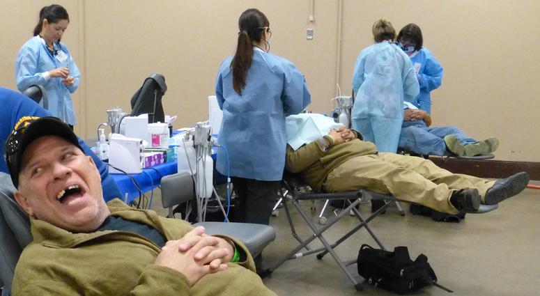 Fifty-six-year-old Steve Bidwell, a U.S. Marine Corps veterans, was in good spirits Friday before having dental work at the North Valley Stand Down.