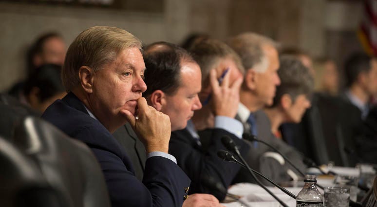 Senator Lindsey Graham of South Carolina listens as Secretary of Defense Ash Carter and Marine Corps Gen. Joseph F. Dunford Jr., chairman of the Joint Chiefs of Staff, testify before the Senate Armed Services Committee on Middle East strategy.