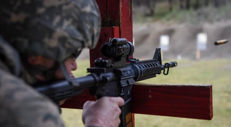 An Airman from the 62nd Maintenance Squadron fires an M-4 carbine during the 627th Security Forces Squadron’s Combat Arms Training and Maintenance (CATM) class at Joint Base Lewis-McChord, Wash., Jan. 31, 2018.