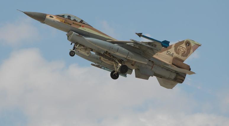 An Israeli F-16 jet fighter takes off from the Uvda air base during an international air force exercise. israeli jet