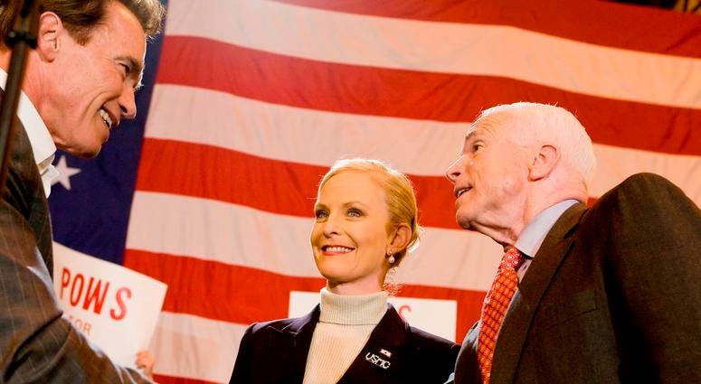 Cindy McCain and her husband Republican presidential hopeful Sen. John McCain greet California Gov. Arnold Schwarzenegger during a rally at the San Diego airport on Tuesday, February 5, 2008, in San Diego, California.