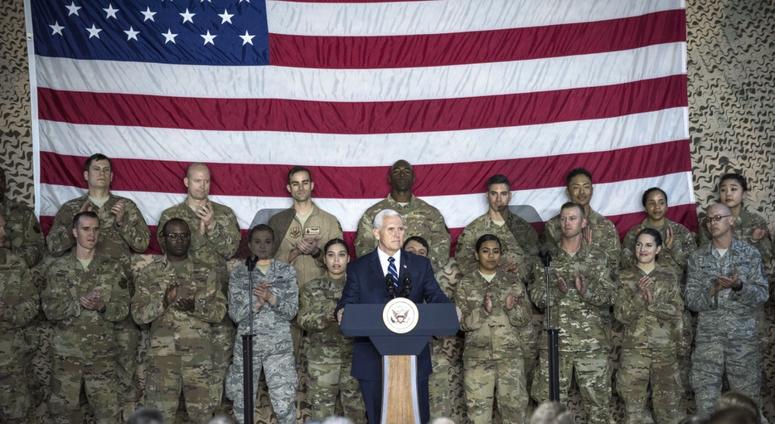 U.S. Vice President Mike Pence speaks to a crowd of deployed service members assigned to the 332d Air Expeditionary Wing January 21, 2018 at an undisclosed location in Southwest Asia. Pence’s visit came as part of an extended trip across the Middle East.