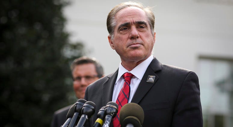 Veterans Affairs Secretary David Shulkin, pauses as he speaks with the media after he attended President Donald Trump signing the National Veterans and Military Families Month Proclamation.