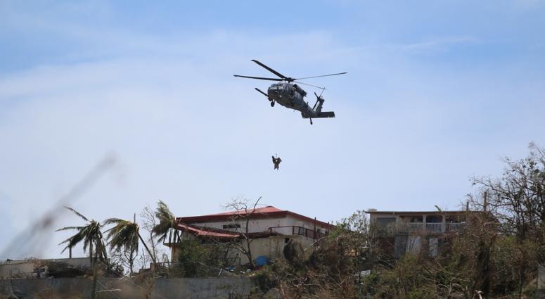In response to Hurricane Irma, members of the U.S. Navy perform rescue missions