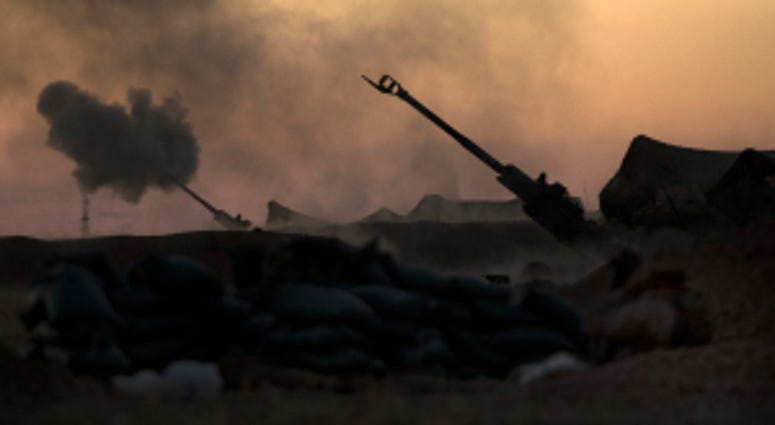UNDISCLOSED LOCATION, SYRIA (June 2, 2017) — U.S. Marines fire an M777-A2 Howitzer in Syria, June 2, 2017 Syria