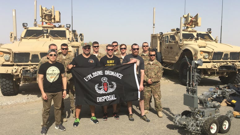 Lex McMahon (in hat) and Titan FC fighters visited the troops in Kuwait in 2016. Titan FC COO Lex McMahon and Titan FC Fighters visit with EOD troops on a 2016 visit to Kuwait