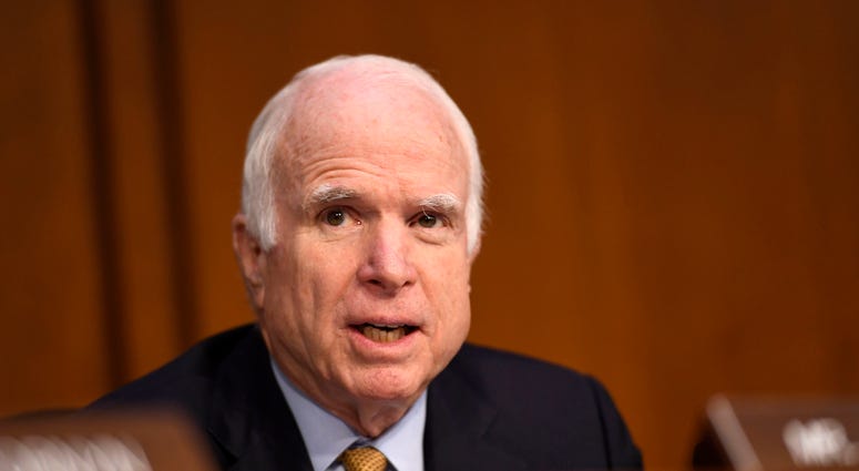 Sen. John McCain, R-Ariz., speaks as former FBI director James Comey testifies in front of the Senate Intelligence Committee in Washington. mccain