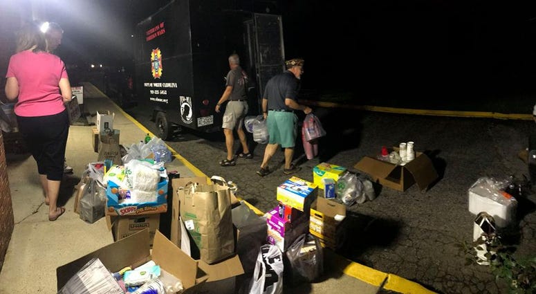 VFW members from Post 7383 in Cary, NC load up their first trailer of relief supplies destined for victims of Florence