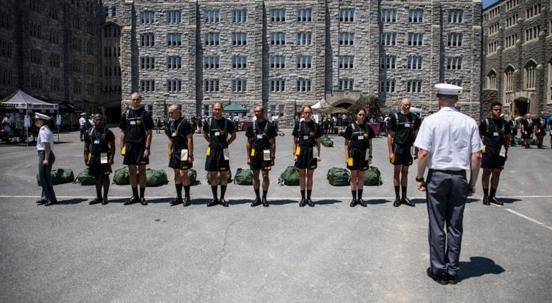 A United States Military Academy at West Point senior teaches new cadets how to salute and march during Reception Day July 2, 2018. The more than 1,200 members of the Class of 2022 is composed of 294 women, 30% minorities, 16 international students and 10 Newly arrived West Point cadets are taught to salute and march
