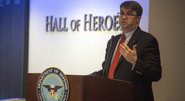 Robert Wilkie, Under Secretary of Defense for Personnel and Readiness, speaks to a gathering of service members from each military branch about the importance of family readiness at the 2017 Department of Defense Family Readiness Award.