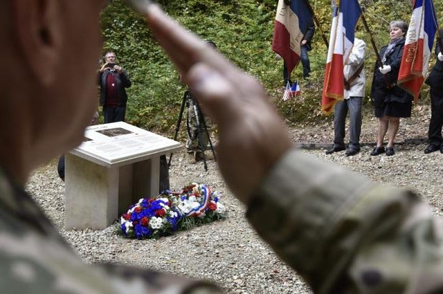 U.S. Air Force Col. Jason Glass, Tennessee Air National Guard commander, renders a salute during a wreath laying ceremony Oct. 7 in Châtel-Chéhéry, France. The ceremony commemorated the heroic acts of Sgt. Alvin C. York.