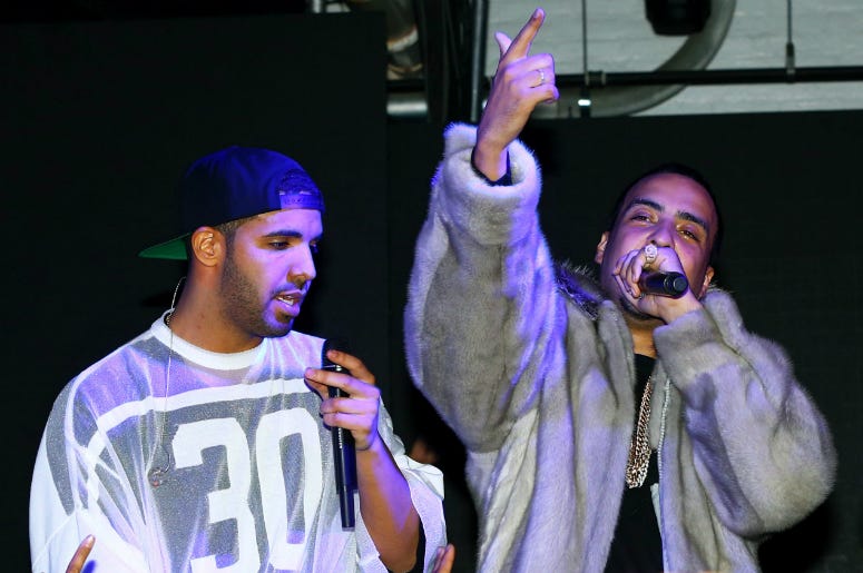 Drake & French Montana Recording artist/rapper Drake (left) French Montana (center) and Sean Combs aka Diddy during the Revolt Party at the Time Warner Cable Studios.