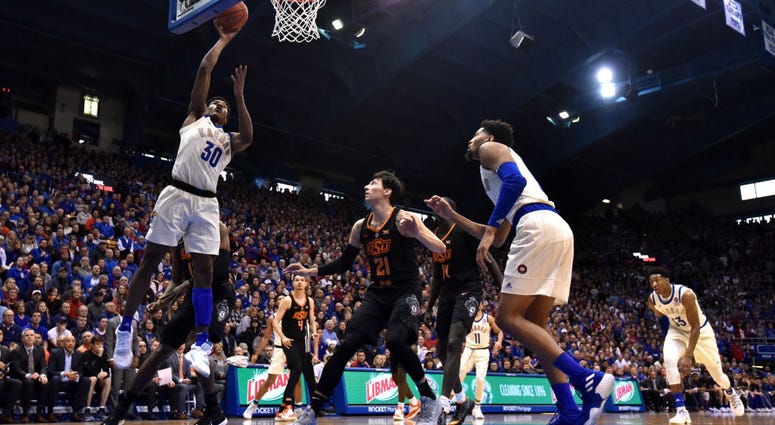 Photo of Kansas player attempting a layup.