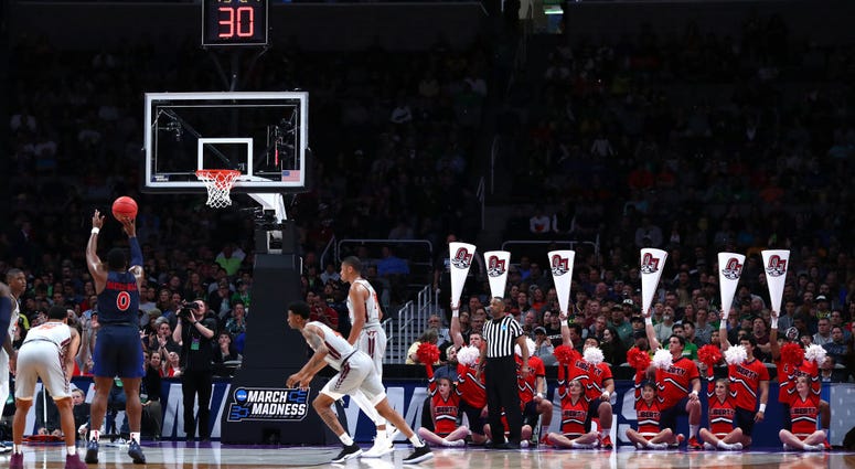 Photo of a Liberty player taking a free throw.