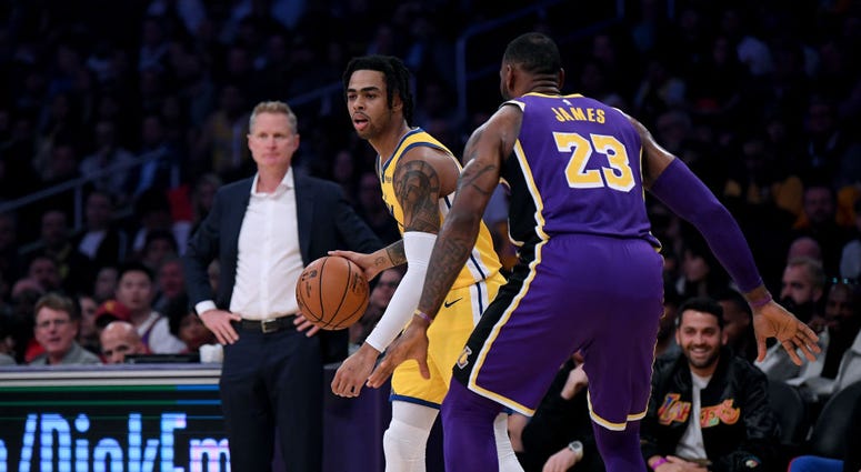 Photo of LeBron James guarding D'Angelo Russell.