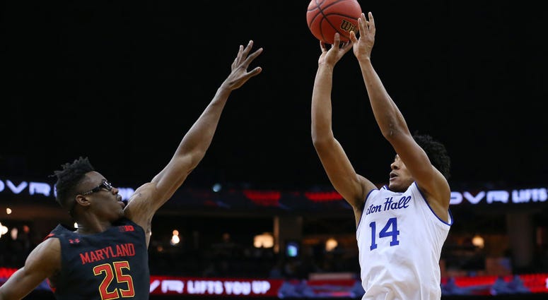 Photo of Seton Hall player shooting the ball.