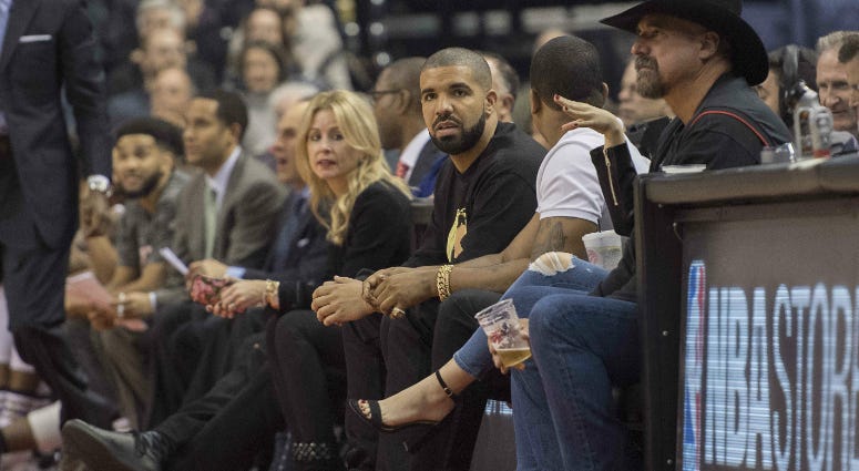Drake courtside at Toronto Raptors NBA Game Drake courtside at Toronto Raptors NBA Game