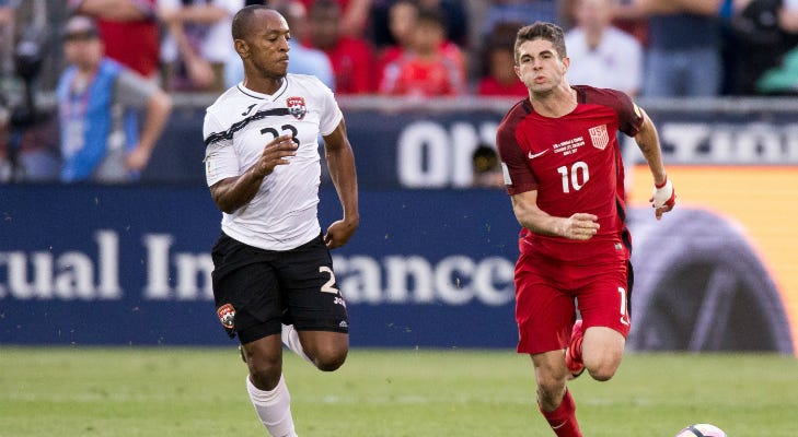 United States midfielder Christian Pulisic (10) controls the ball as Trinidad & Tobago midfielder Leston Paul (23) defends in the second half at Dick's Sporting Goods Park. Soccer: FIFA World Cup Qulifier-Trinidad & Tobago at USA