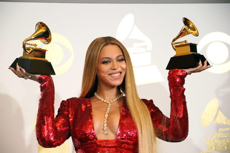 Beyonce Knowles poses during the 59th Annual GRAMMY Awards Beyonce Knowles poses during the 59th Annual GRAMMY Awards
