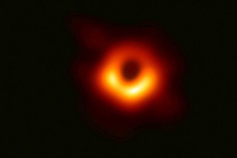 This image released Wednesday, April 10, 2019, by Event Horizon Telescope shows a black hole. Scientists revealed the first image ever made of a black hole after assembling data gathered by a network of radio telescopes around the world. (Event Horizon Te