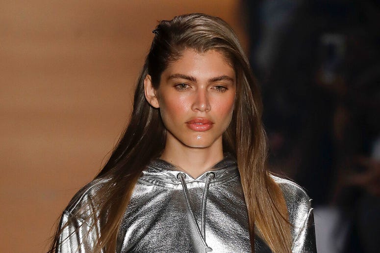 In this March 16, 2017, file photo Brazilian transgender model Valentina Sampaio wears a creation from the Amir Slama collection during Sao Paulo Fashion Week in Sao Paulo, Brazil. Sampaio has become the first openly transgender model hired by Victoria’s