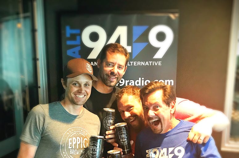 Nate, Clayton, Jeremy and Ken show off their crowlers