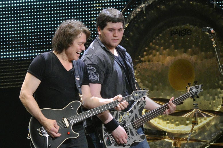 Guitarist Eddie Van Halen and his son/bassist Wolfgang Van Halen Guitarist Eddie Van Halen and his son/bassist Wolfgang Van Halen