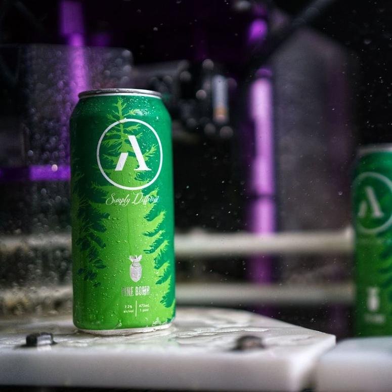 Abnormal Beer Co. Pine Bomb IPA is seasonally available in four-packs and on draft. Abnormal Beer Co. Pine Bomb IPA available in four-packs seasonally