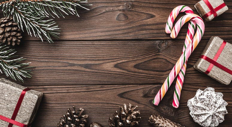 Fir tree, decorative cone, sweets, and gifts for holidays. Fir tree, decorative cone, sweets, and gifts for holidays.