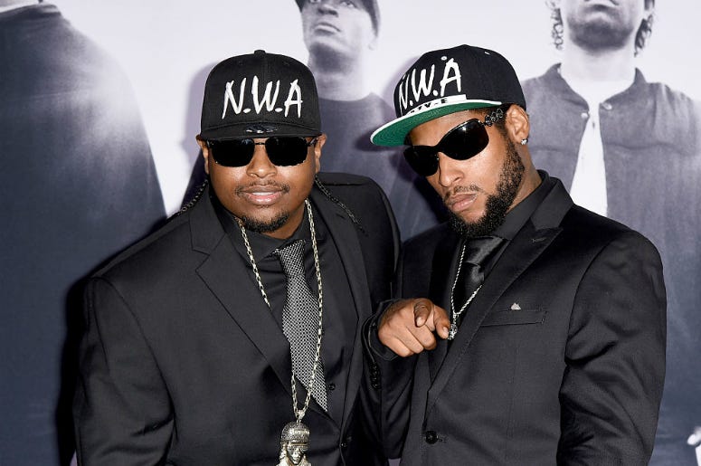 Eric Wright, Jr., (L) and his brother Derrek Wright, sons of rapper Eazy-E arrive at the premiere of Universal Pictures and Legendary Pictures' 'Straight Outta Compton' at the Microsoft Theatre on August 10, 2015 in Los Angeles, California. Eric Wright, Jr., (L) and his brother Derrek Wright, sons of rapper Eazy-E arrive at the premiere of Universal Pictures and Legendary Pictures' 'Straight Outta Compton' at the Microsoft Theatre on August 10, 2015 in Los Angeles, California.