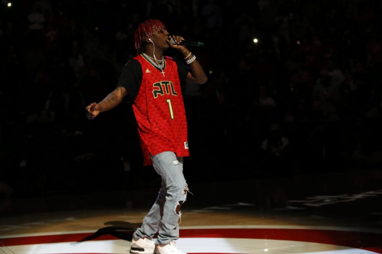 Lil Yachty performs at halftime of a game between the Atlanta Hawks and Washington Wizards at Philips Arena. Lil Yachty performs at halftime of a game between the Atlanta Hawks and Washington Wizards at Philips Arena.