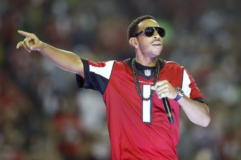 Recording artist Ludacris performs during half time of the NFC Divisional playoff between the Atlanta Falcons and the Seattle Seahawks at Georgia Dome. Recording artist Ludacris performs during half time of the NFC Divisional playoff between the Atlanta Falcons and the Seattle Seahawks at Georgia Dome.