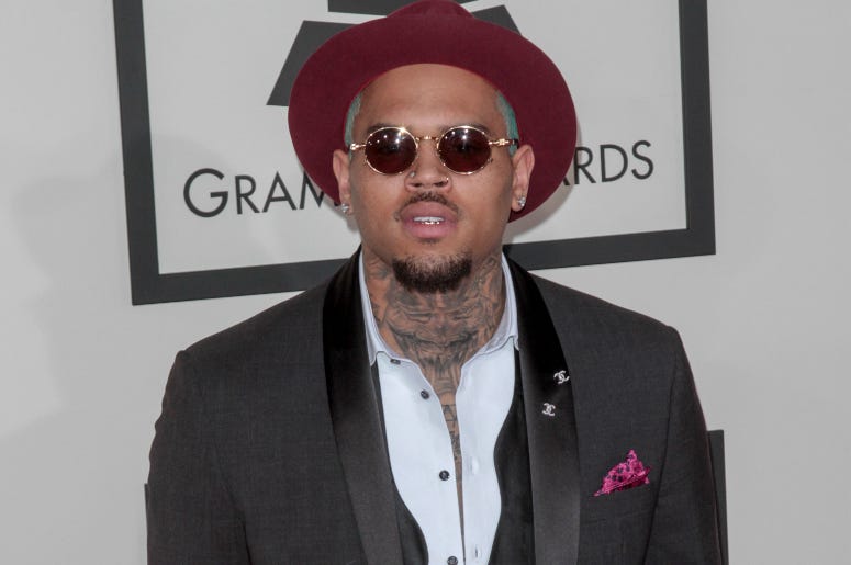 Chris Brown arrives at the 57th Annual Grammy Awards. Chris Brown arrives at the 57th Annual Grammy Awards.