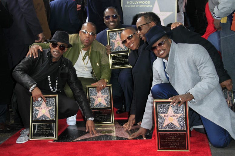 Ricky Bell, Michael Bivins, Bobby Brown, Ronnie DeVoe, Johnny Gill, Ralph Tresvant, of New Edition at the New Edition Walk of Fame Star Ceremony at Hollywood Walk of Fame. Ricky Bell, Michael Bivins, Bobby Brown, Ronnie DeVoe, Johnny Gill, Ralph Tresvant, of New Edition at the New Edition Walk of Fame Star Ceremony at Hollywood Walk of Fame.