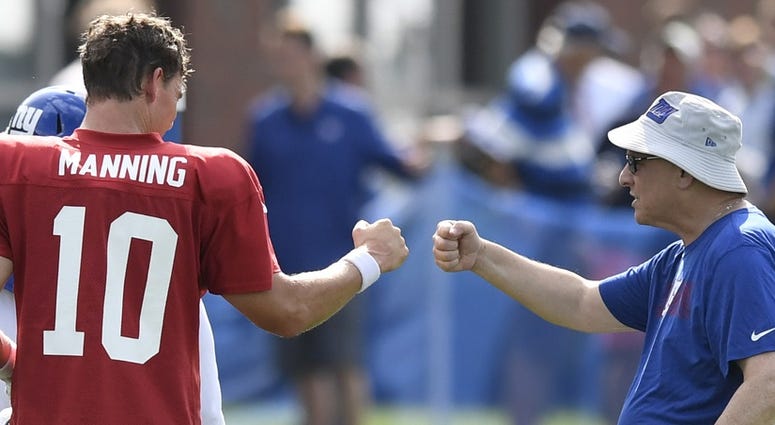 Dave Gettleman and Eli Manning Dave Gettleman and Eli Manning