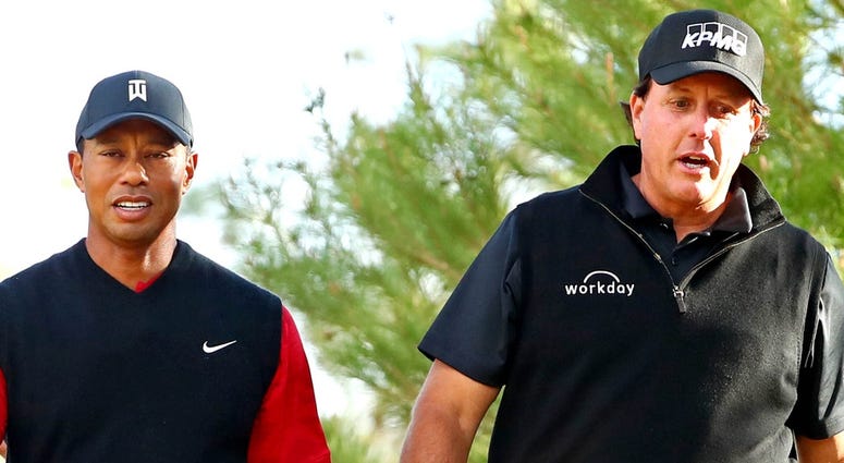 Phil Mickelson and Tiger Woods Phil Mickelson and Tiger Woods