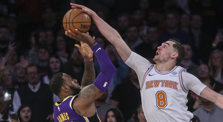 LeBron James and Mario Hezonja LeBron James and Mario Hezonja